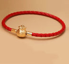 FúFlow™ - Pulseira Talismã de Prosperidade 福 | Couro Trançado e Banho Ouro 18K