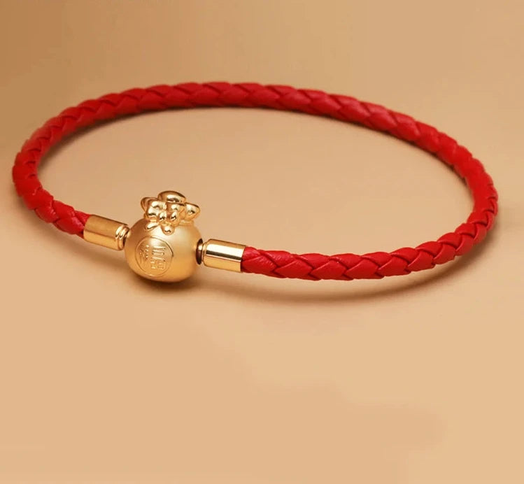 FúFlow™ - Pulseira Talismã de Prosperidade 福 | Couro Trançado e Banho Ouro 18K