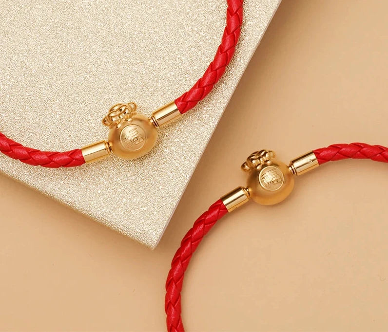FúFlow™ - Pulseira Talismã de Prosperidade 福 | Couro Trançado e Banho Ouro 18K