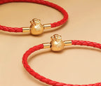 FúFlow™ - Pulseira Talismã de Prosperidade 福 | Couro Trançado e Banho Ouro 18K