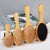 BambooFlow™ - Escova Massageadora de Bambu Natural | Reduz Queda Capilar e Estimula Crescimento