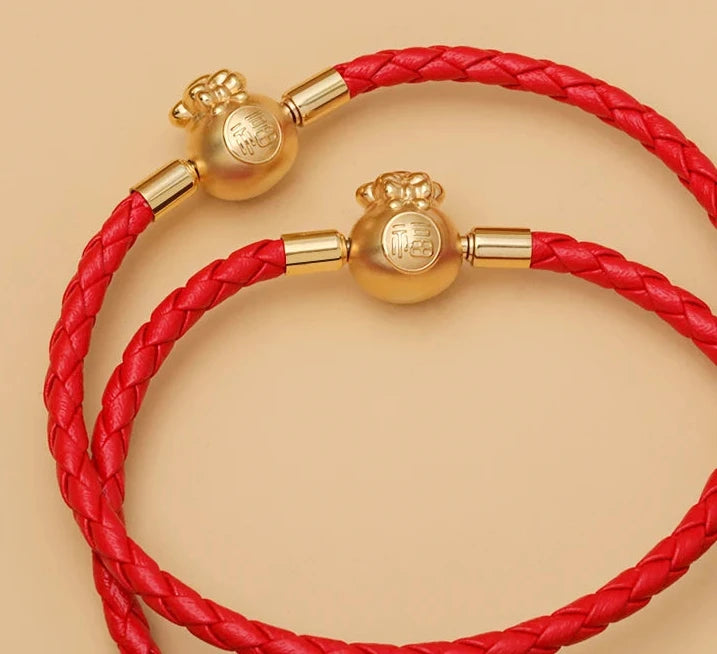 FúFlow™ - Pulseira Talismã de Prosperidade 福 | Couro Trançado e Banho Ouro 18K